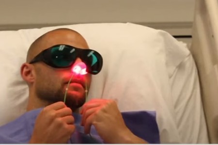 Covid patient using nasal red light therapy